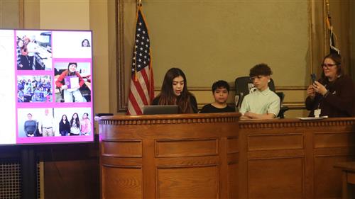 CVLA student speak at podium at Chelsea School Committee meeting